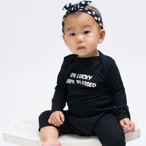0% Lucky 100% Blessed Onesie